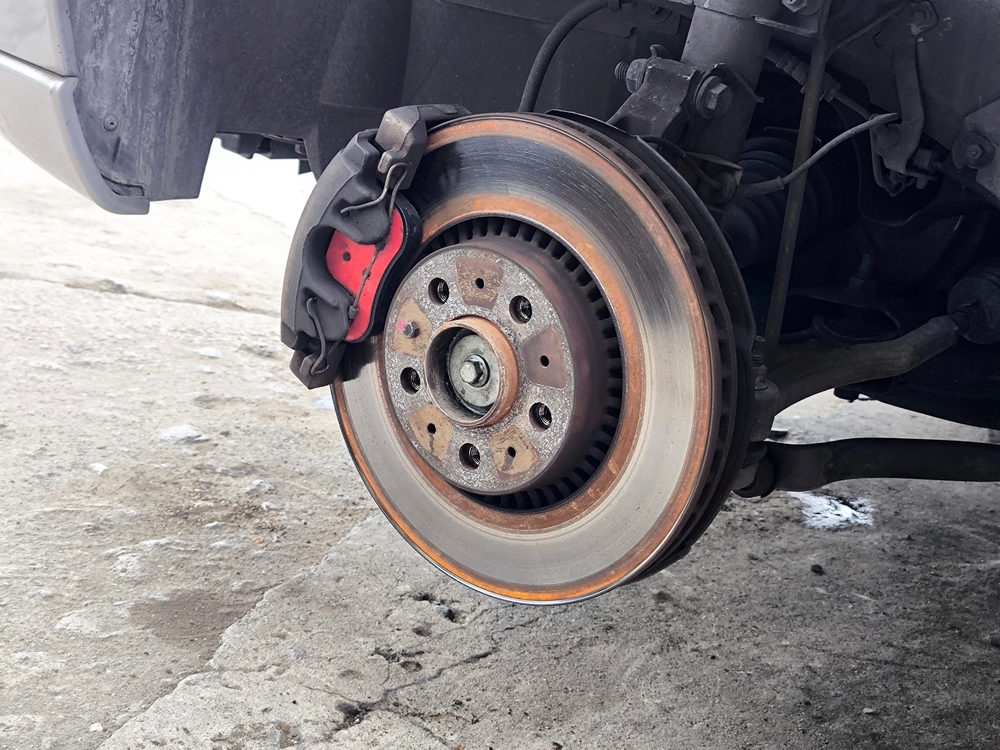 Close-up,Of,Car,Brake,Disc,And,Caliper.,Car,Tire,Repair